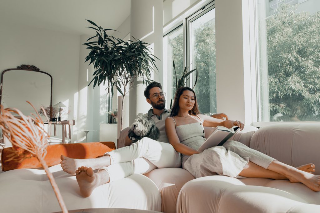 Couple relaxing on the sofa in a guest house