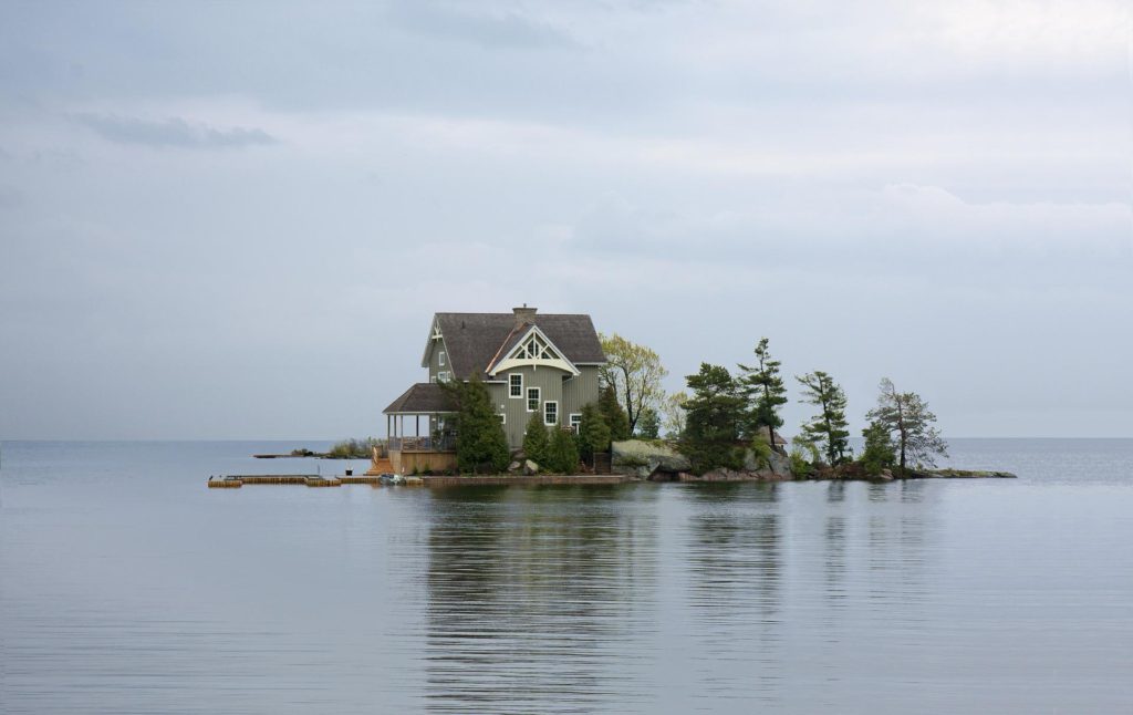 House on lake surrounded by water
