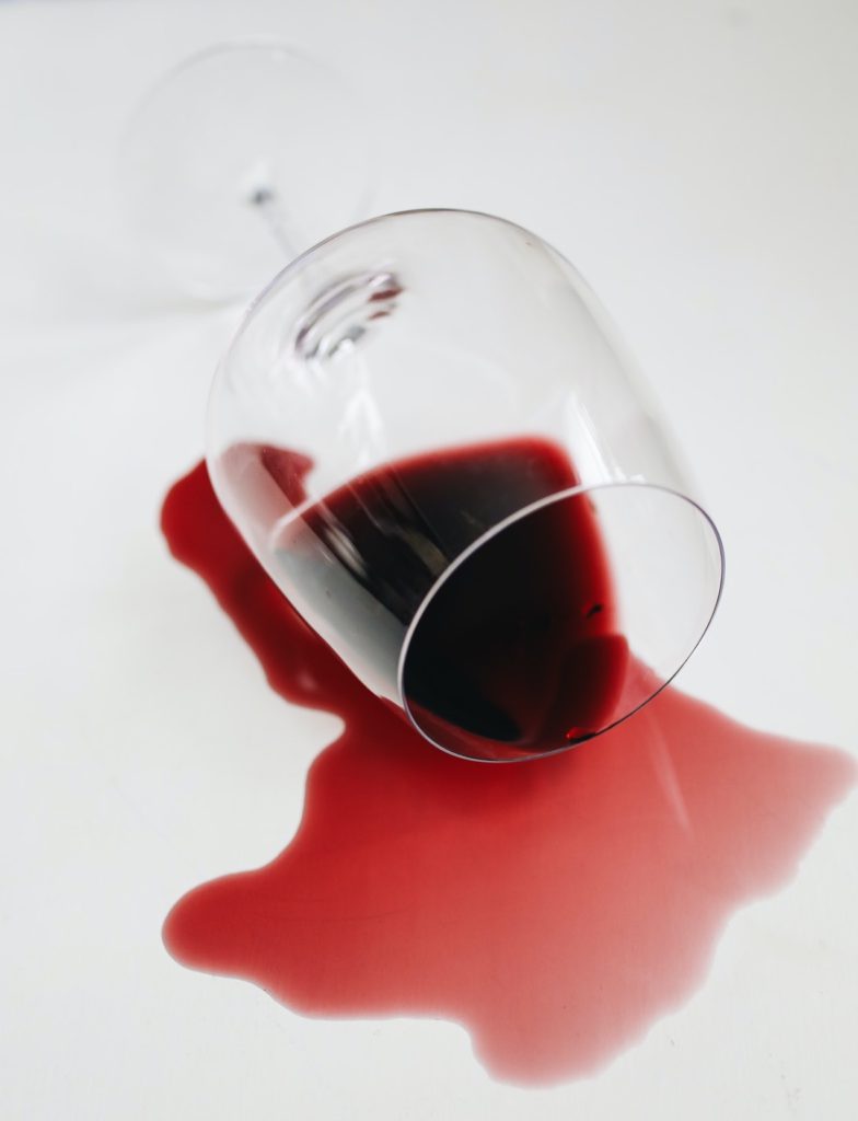 Wine spilling out of glass